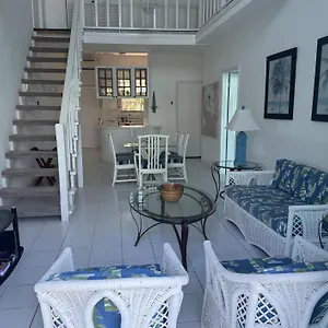 https://sunset-cove-live-on-the-beach.comcaribbean.com